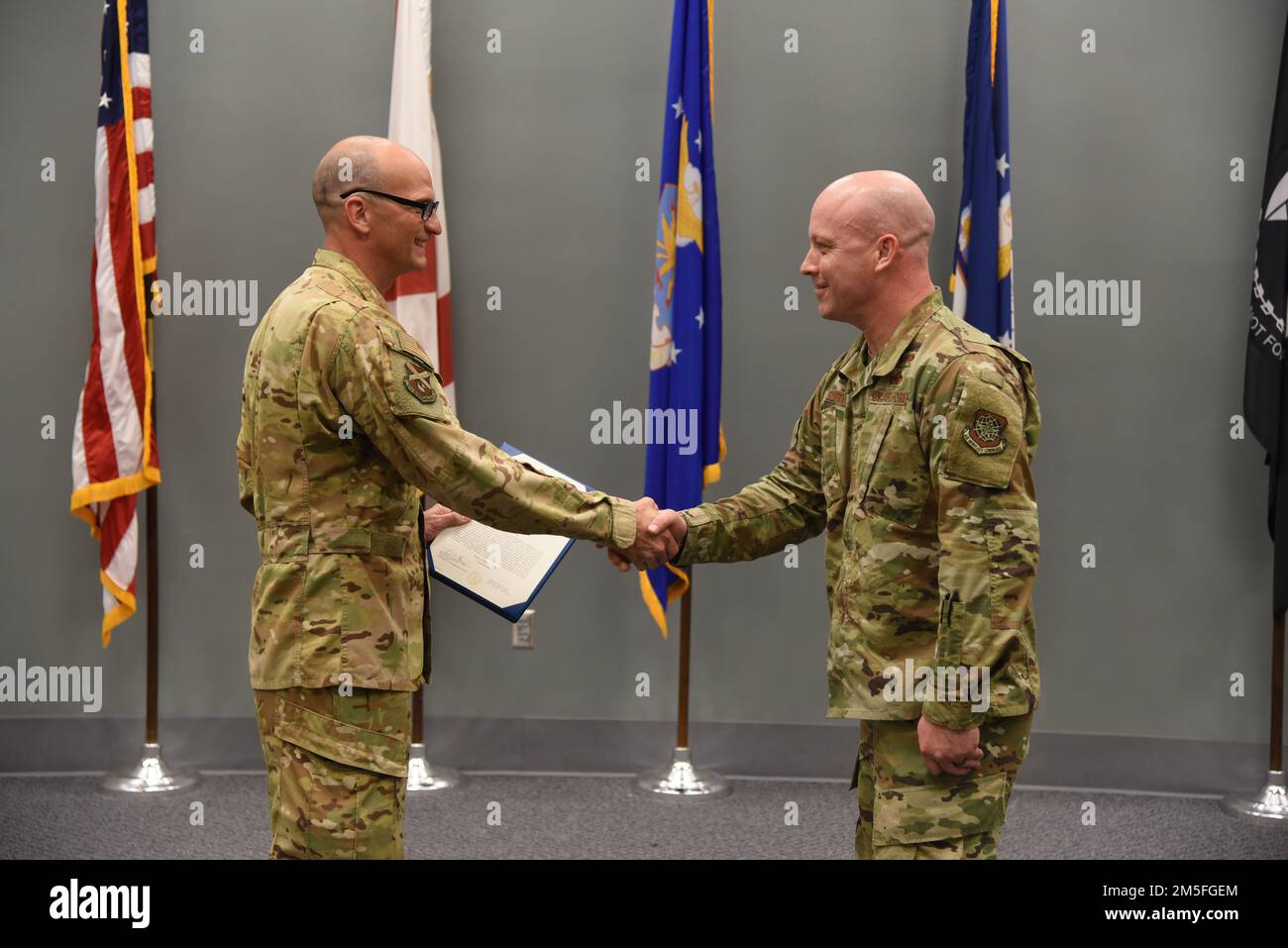 Senior Master Sgt. Justin Smith receives the Meritorious Service Medal at Sumpter Smith Joint National Guard base, Birmingham, Ala., on March 12, 2022. Smith received this award for helping to acquire a Hydraulic Test Stand in the history of the Air Force as well as his efforts overseas while deployed to Kandahar Airfield. Stock Photo