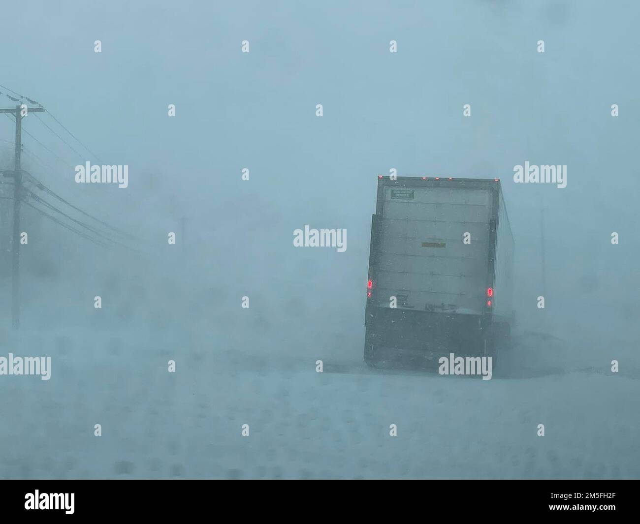 Lancaster, New York, USA. 24th Dec, 2022. A truck is left stranded on