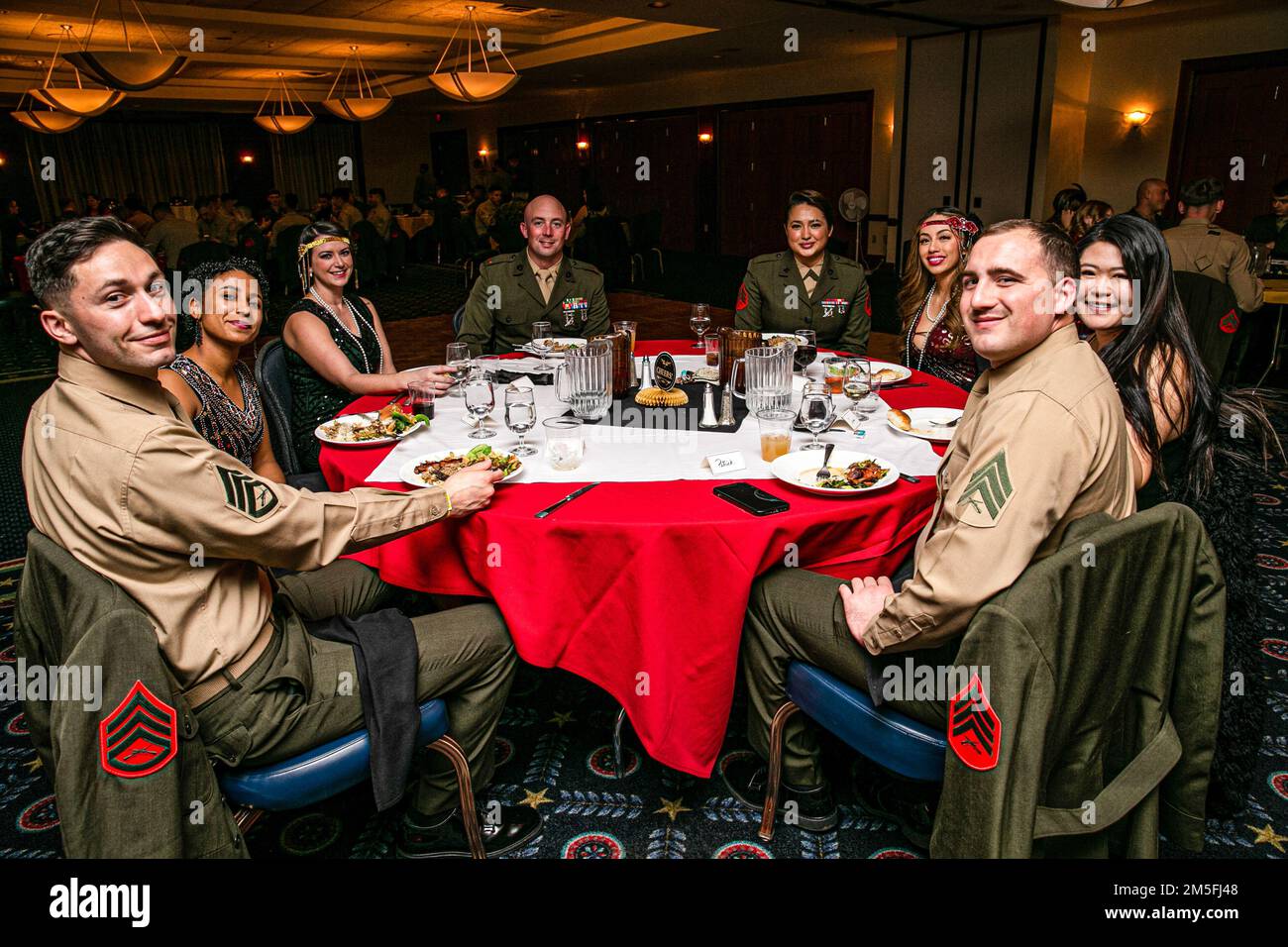 Andrews Air Force Base  – U.S. Marines with Chemical Biological Radiological Nuclear (CBRN) Alpha platoon had a formal dinner with family members aboard Andrews AFB, Md. CBRN Marines spent the night sustaining and reinforcing relationships with platoon and family members. (Official U.S. Marine Corps photo by Pfc. Angel Ponce/Released) Stock Photo