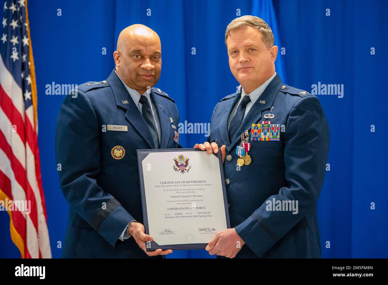 Col. Fred Ehrman, right, assistant to the command chaplain at United States Air Forces Europe and Air Forces Africa, receives his certificate of retirement from Maj. Gen. Charles Walker, director of the Office of Complex Investigations at the National Guard Bureau, during a ceremony at the Kentucky Air National Guard Base in Louisville, Ky., March 13, 2022. Ehrman served as a chaplain at the Kentucky Air National Guard’s 123rd Airlift Wing for 16 years. Stock Photo