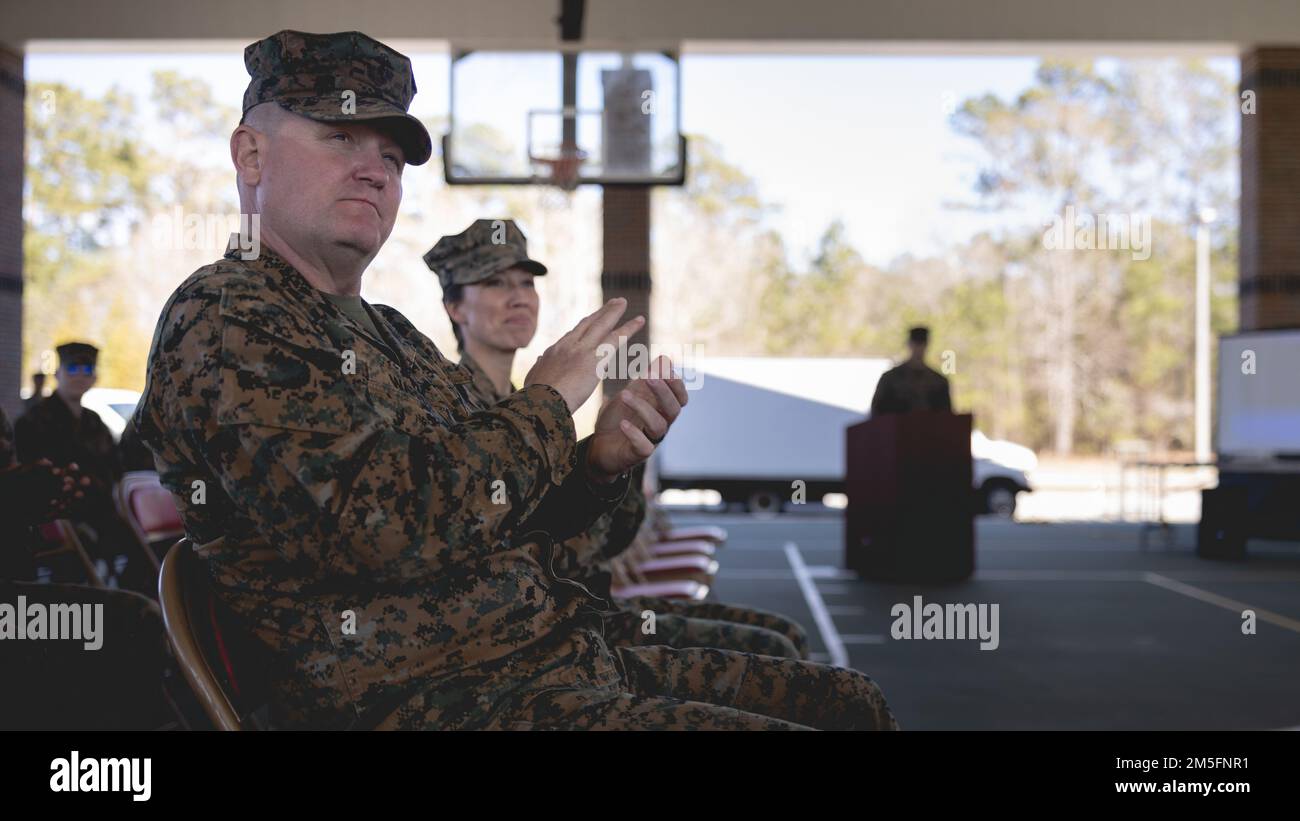 U.S. Marine Corps Sgt. Maj. Daniel J. Warren, sergeant major with Wounded Warrior Regiment, Marine Corps Base (MCB) Quantico, Virginia, applauds award recipients during the 2022 Wounded Warrior Battalion Marine Corps Trials closing ceremony on MCB Camp Lejeune, North Carolina, March 14, 2022. The Marine Corps Trials is an annual adaptive sports competition that promotes a competitive warrior spirit, builds camaraderie and provides a venue to select participants for the 2022 DoD Warrior Games. Stock Photo