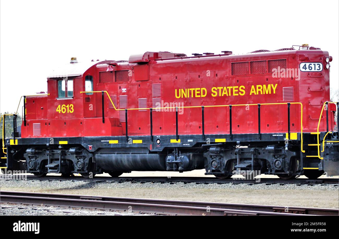 A u s army locomotive used as part of rail operations is shown march