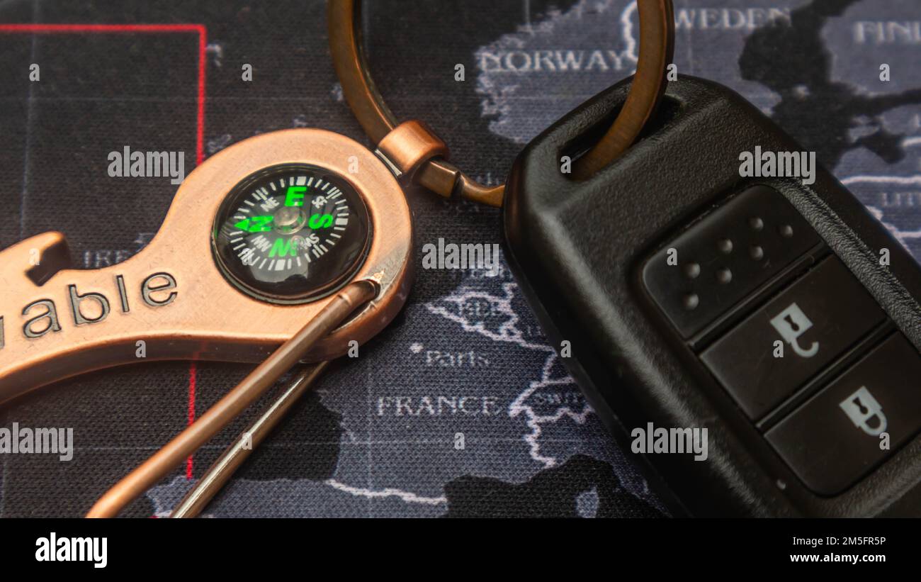 black car key over black map Stock Photo - Alamy