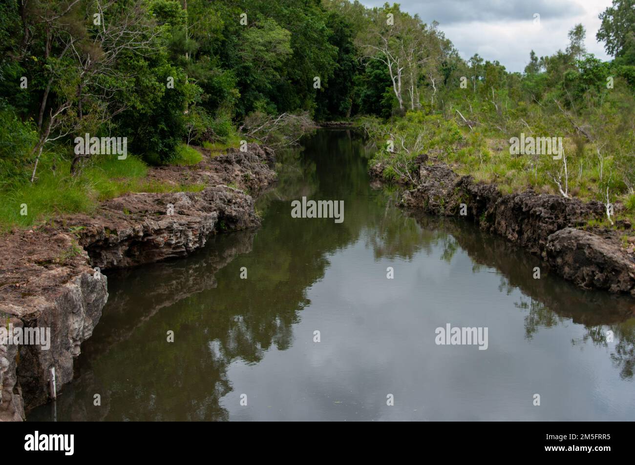 Creek with rocky banks, Ingham, North Queensland, Australia. Stock Photo