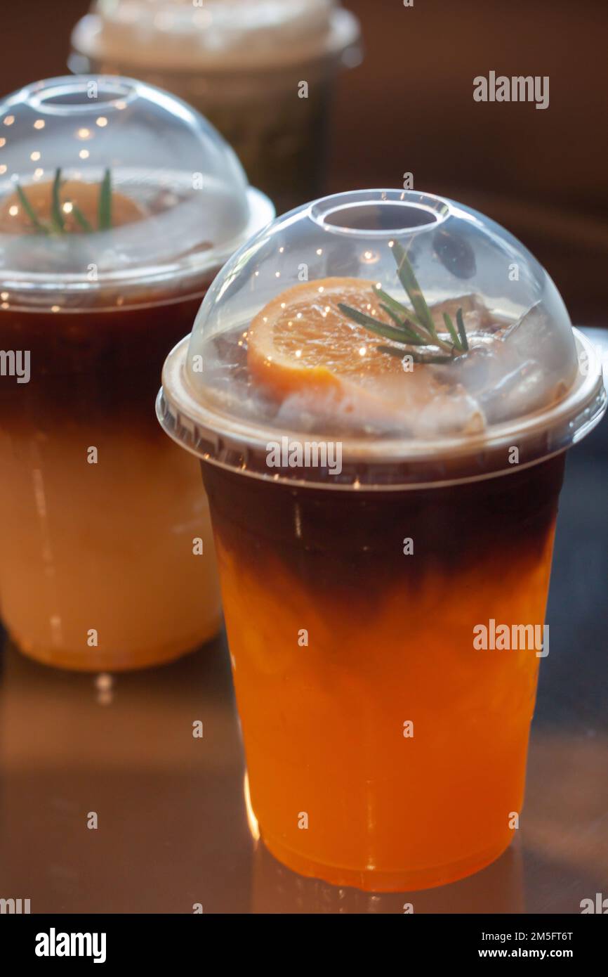 Glass of americano mixed with orange juice, stock photo Stock Photo