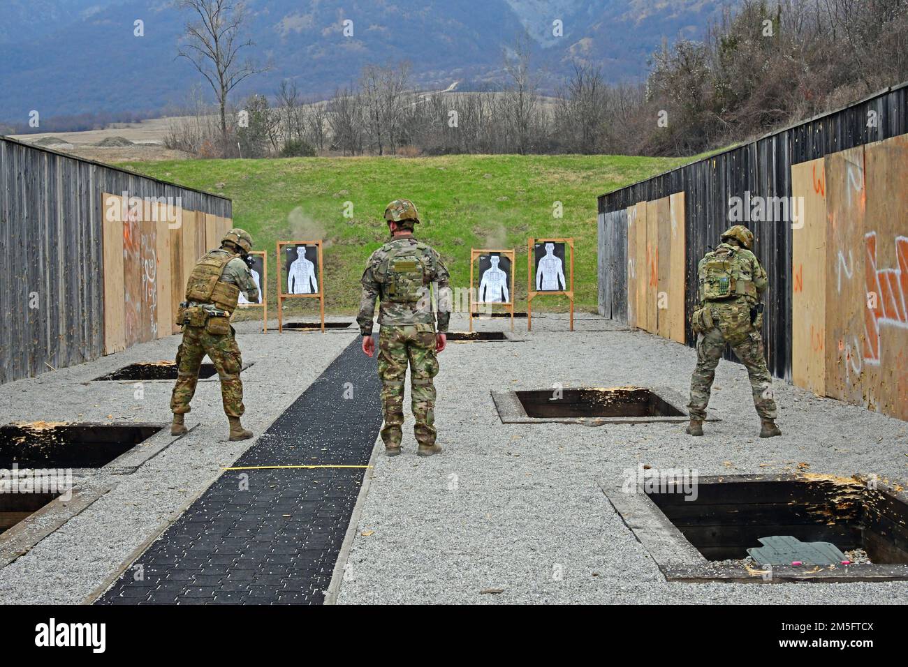 U.S. Army Paratroopers, assigned to the 1st Battalion, 503rd Infantry Regiment, 173rd Airborne Brigade, engage targets with  an M4 carbine during marksmanship training at Cao Malnisio Range, Pordenone, Italy, March 15, 2022. The 173rd Airborne Brigade is the U.S. Army’s Contingency Response Force in Europe, providing rapidly deployable forces to United States European, African, and Central Command areas of responsibility. Stock Photo