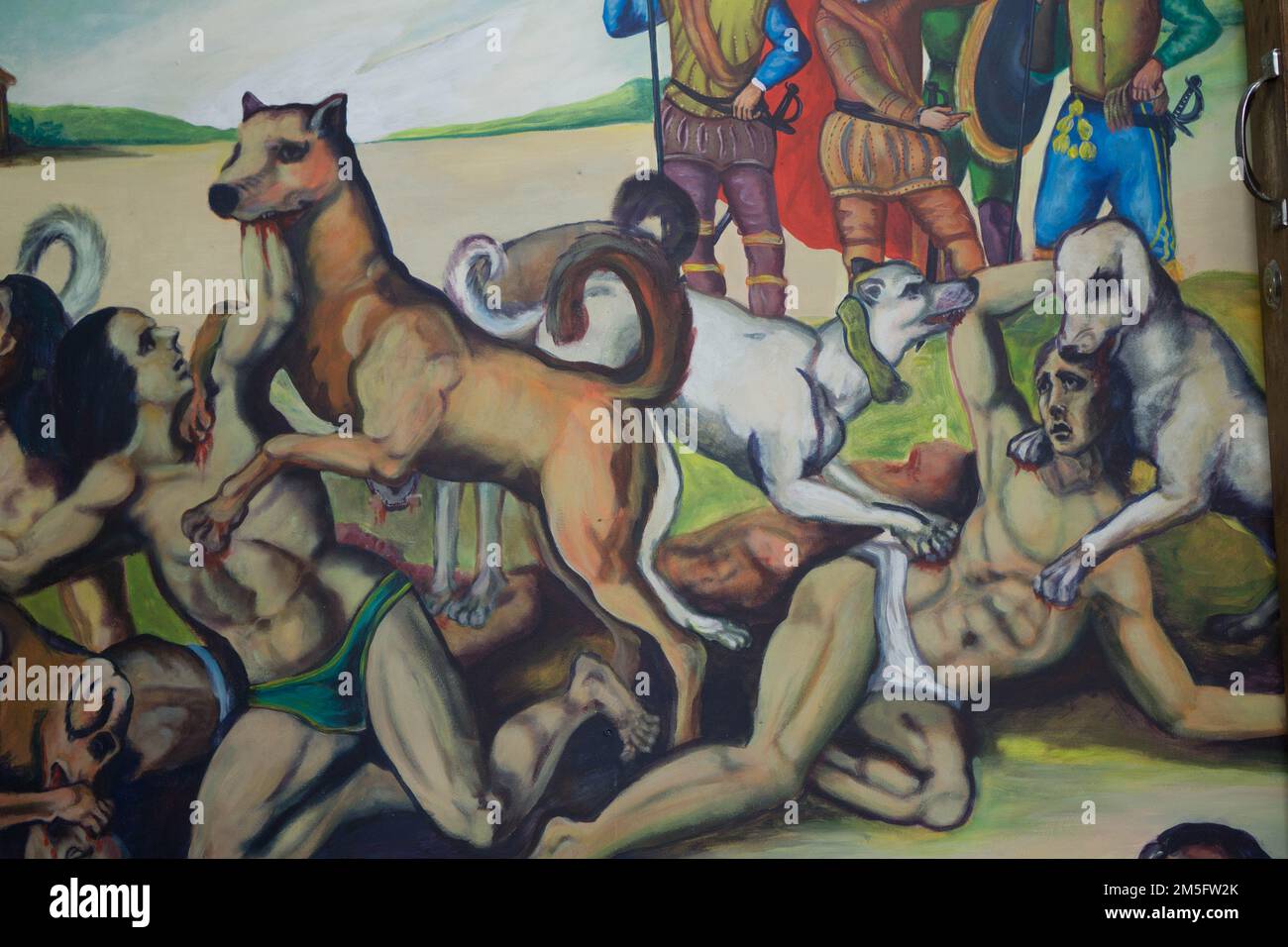 Mural of Spanish using dogs to attack Indigenous people in Boaco, Nicaragua. Stock Photo