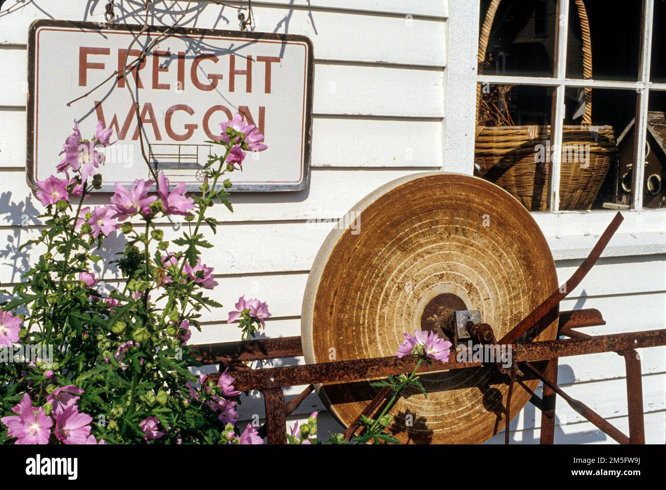 A grinding wheel in front of Freight Wagon Antiques, Weston, VT Stock ...
