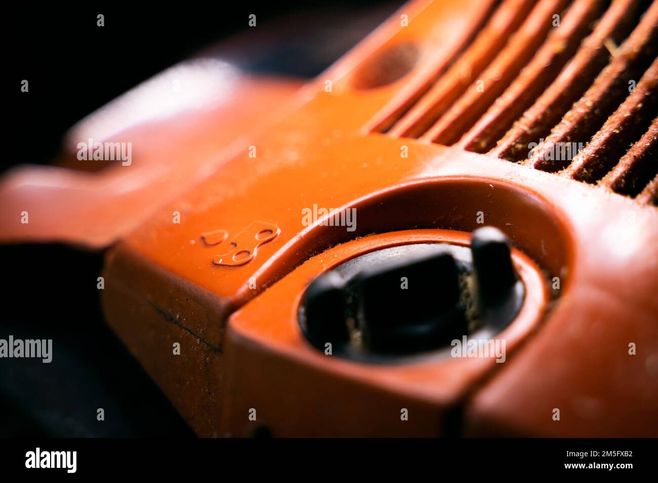A container for filling lubricant for a saw chain in a chainsaw. Oil