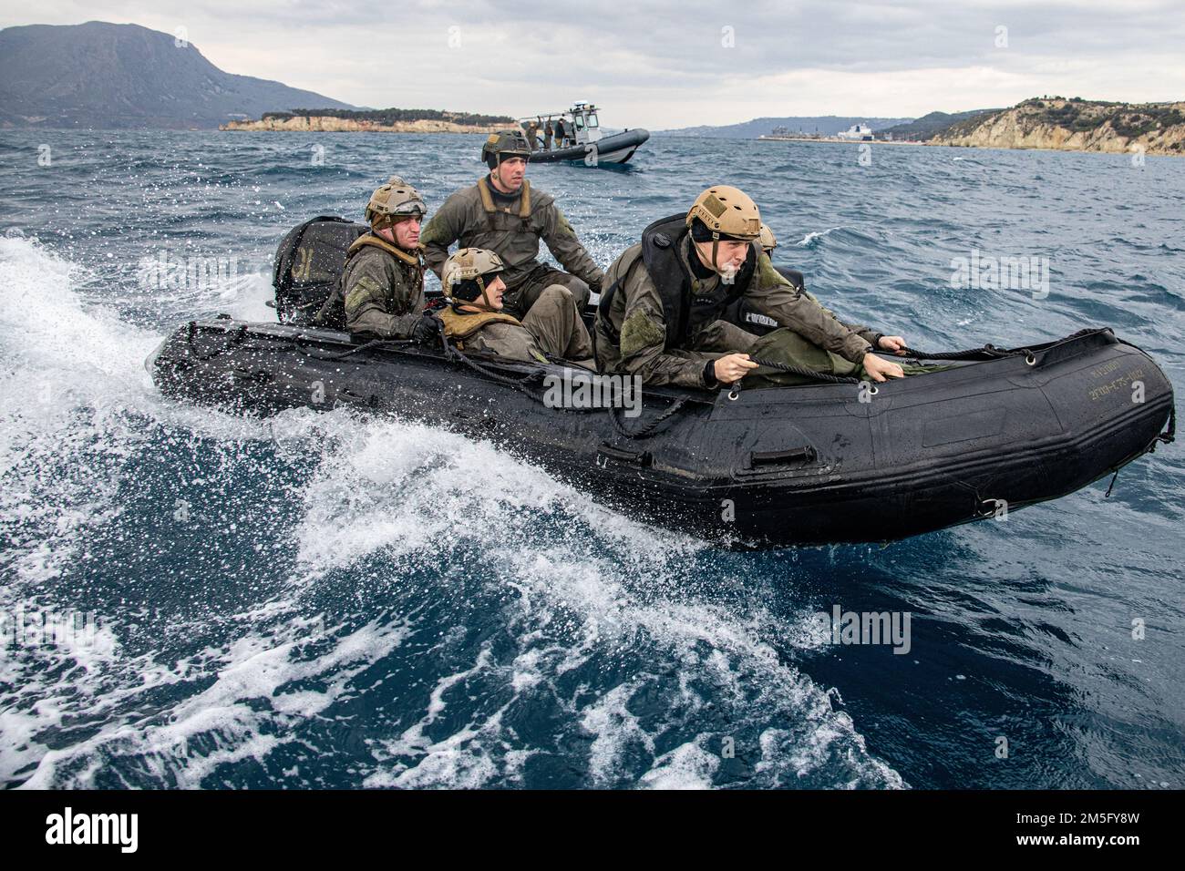 SOUDA BAY, Greece (March 15, 2022) U.S. Marines assigned to Task Force 61/2 conduct casualty evacuation and snag-and-tow rehearsals with Sailors from Task Group 68.1 in Souda Bay, Greece March 15, 2022. Task Force 61/2 will temporarily provide command-and-control support to the commander of U.S. Sixth Fleet, and synchronize Navy and Marine Corps units and capabilities already in theater, in support of regional Allies and Partners and U.S. national security interests. Stock Photo