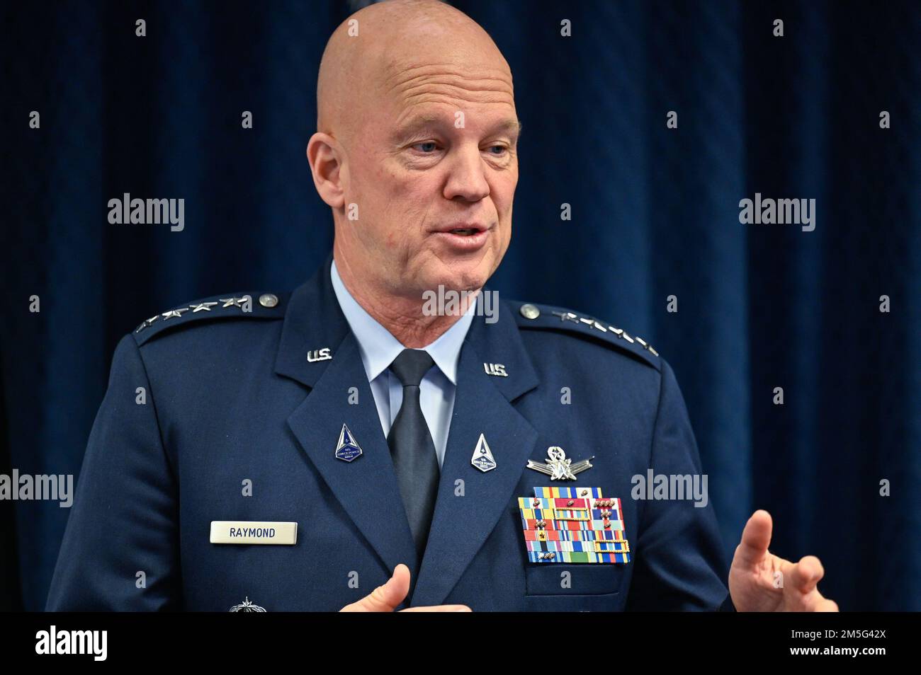 Chief of Space Operations Gen. John W. “Jay” Raymond makes remarks during the promotion of Brig. Gen. Shawn Bratton to major general at the Pentagon, Arlington, Va., March 16, 2022. Bratton is the commander of Space Training and Readiness Command. Stock Photo