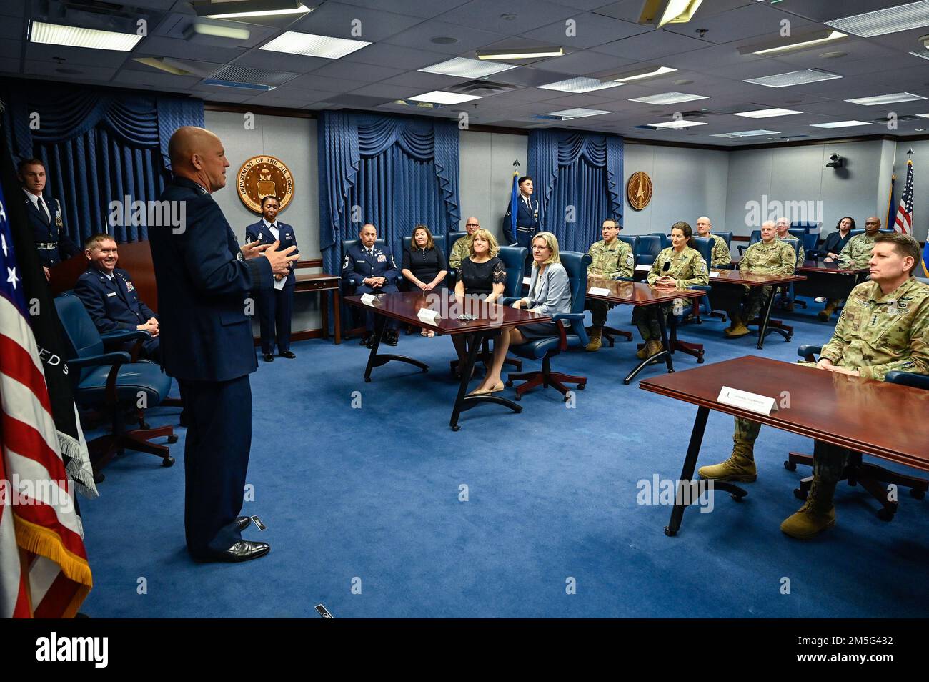 Chief of Space Operations Gen. John W. “Jay” Raymond makes remarks during the promotion of Brig. Gen. Shawn Bratton to major general at the Pentagon, Arlington, Va., March 16, 2022. Bratton is the commander of Space Training and Readiness Command. This image has been altered to obscure security badges. Stock Photo