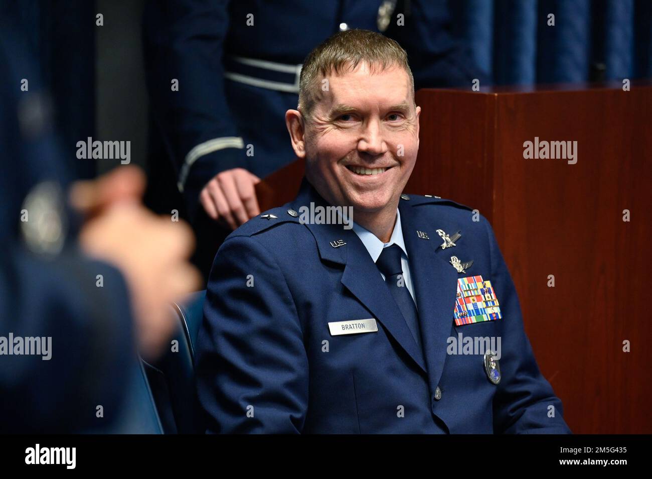 Brig. Gen. Shawn Bratton listens to remarks from Chief of Space Operations Gen. John W. “Jay” Raymond during his promotion to major general at the Pentagon, Arlington, Va., March 16, 2022. Bratton is the commander of Space Training and Readiness Command. Stock Photo
