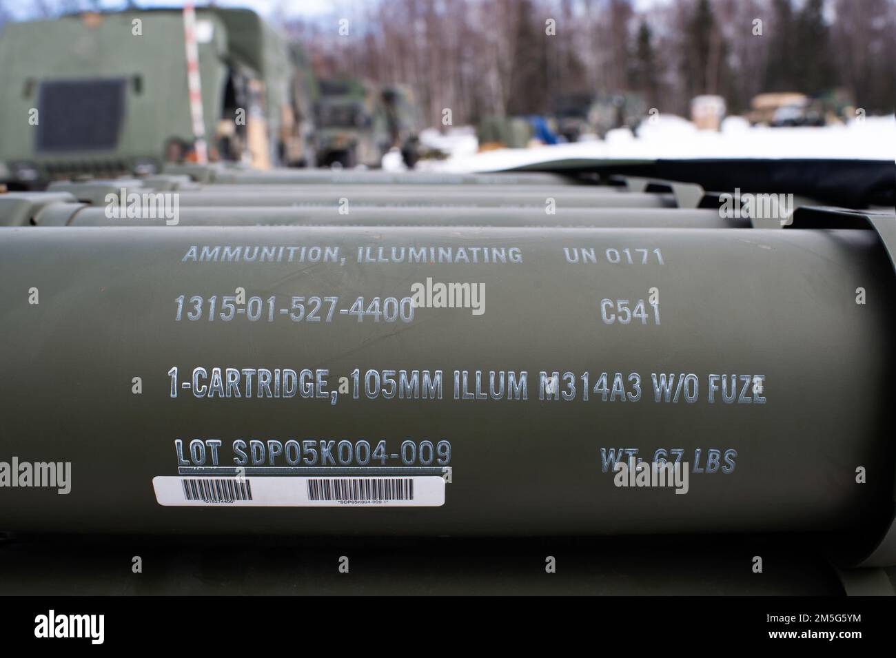 Ammunition for M119 105 mm howitzers is staged for U.S. Army paratroopers assigned to Bravo Battery, 2nd Battalion, 377th Parachute Field Artillery Regiment, 4th Infantry Brigade Combat Team (Airborne), 25th Infantry Division, as they conduct live-fire artillery training at Joint Base Elmendorf-Richardson, Alaska, March 16, 2022. The Soldiers of 4/25 belong to the only American airborne brigade in the Pacific and are trained to execute airborne maneuvers in extreme cold weather and high altitude environments in support of combat, partnership and disaster relief operations. Stock Photo