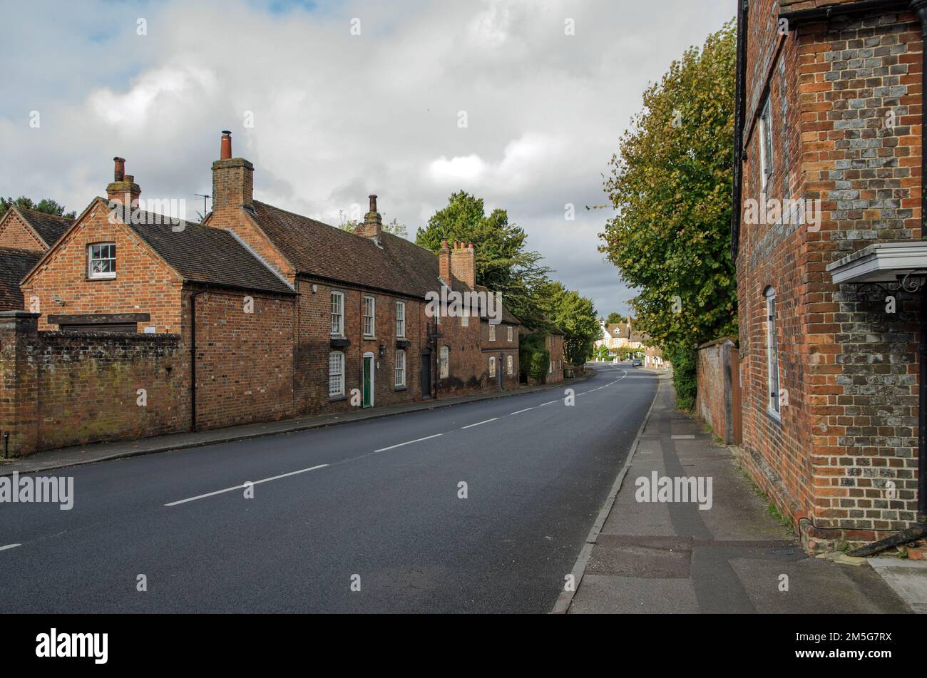 View along the main road known as The Street in the historic village of Aldermaston in Berkshire. Stock Photo