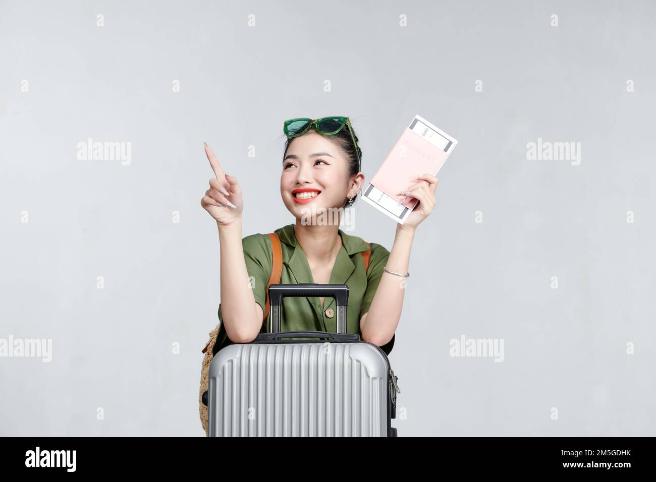 Cheerful woman passport and plane ticket vacation airport Stock Photo