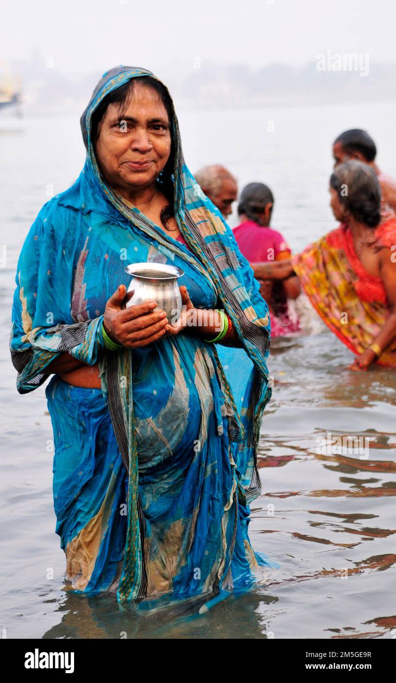 Early morning bathing and prayers at Babughat on the banks of the ...