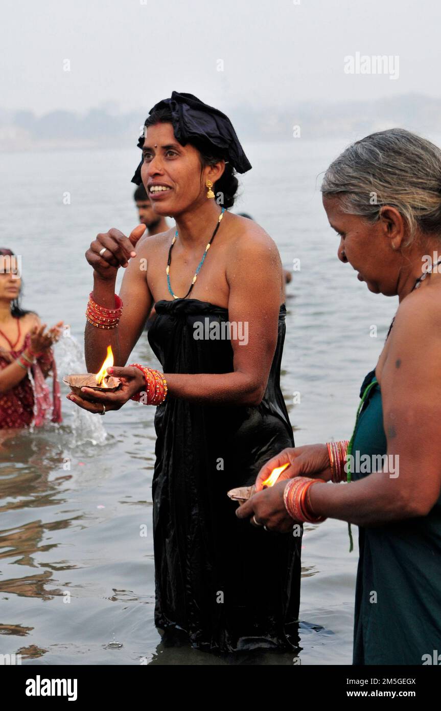Early morning bathing and prayers at Babughat on the banks of the ...