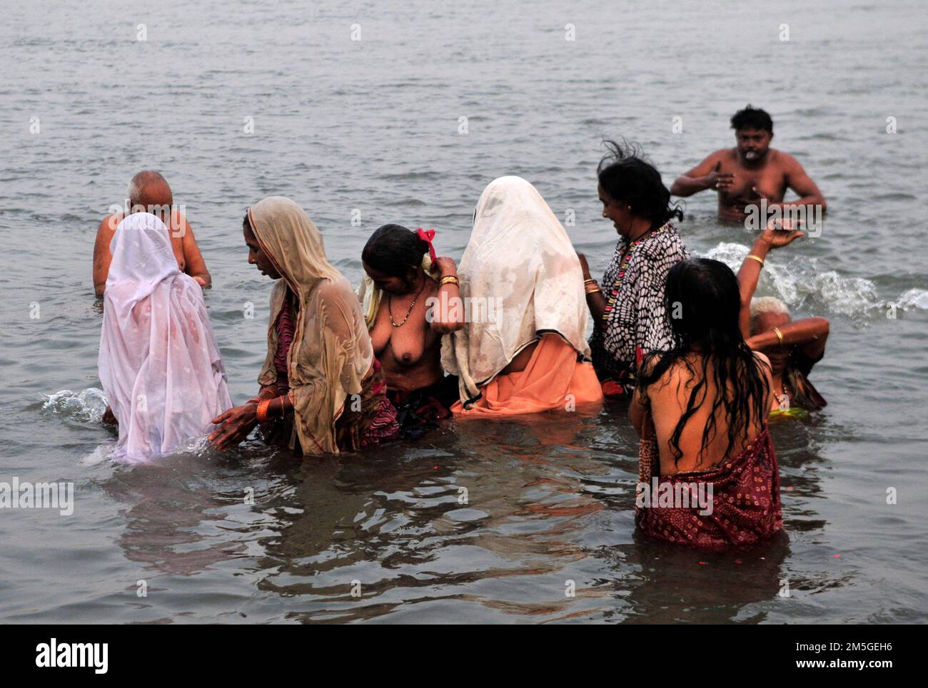 Early morning bathing and prayers at Babughat on the banks of the ...