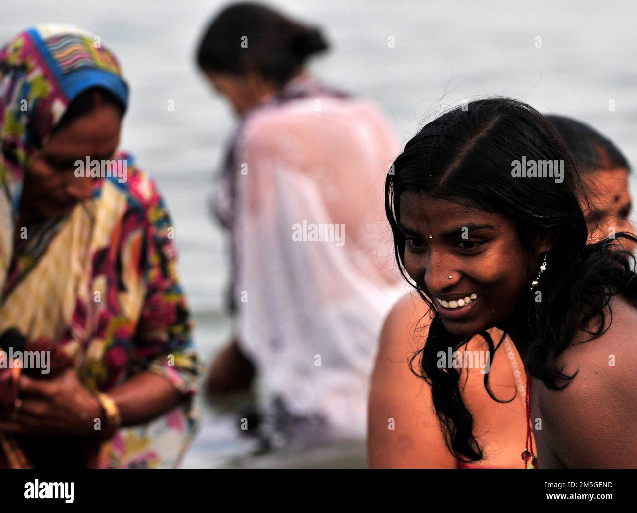 Early morning bathing and prayers at Babughat on the banks of the ...