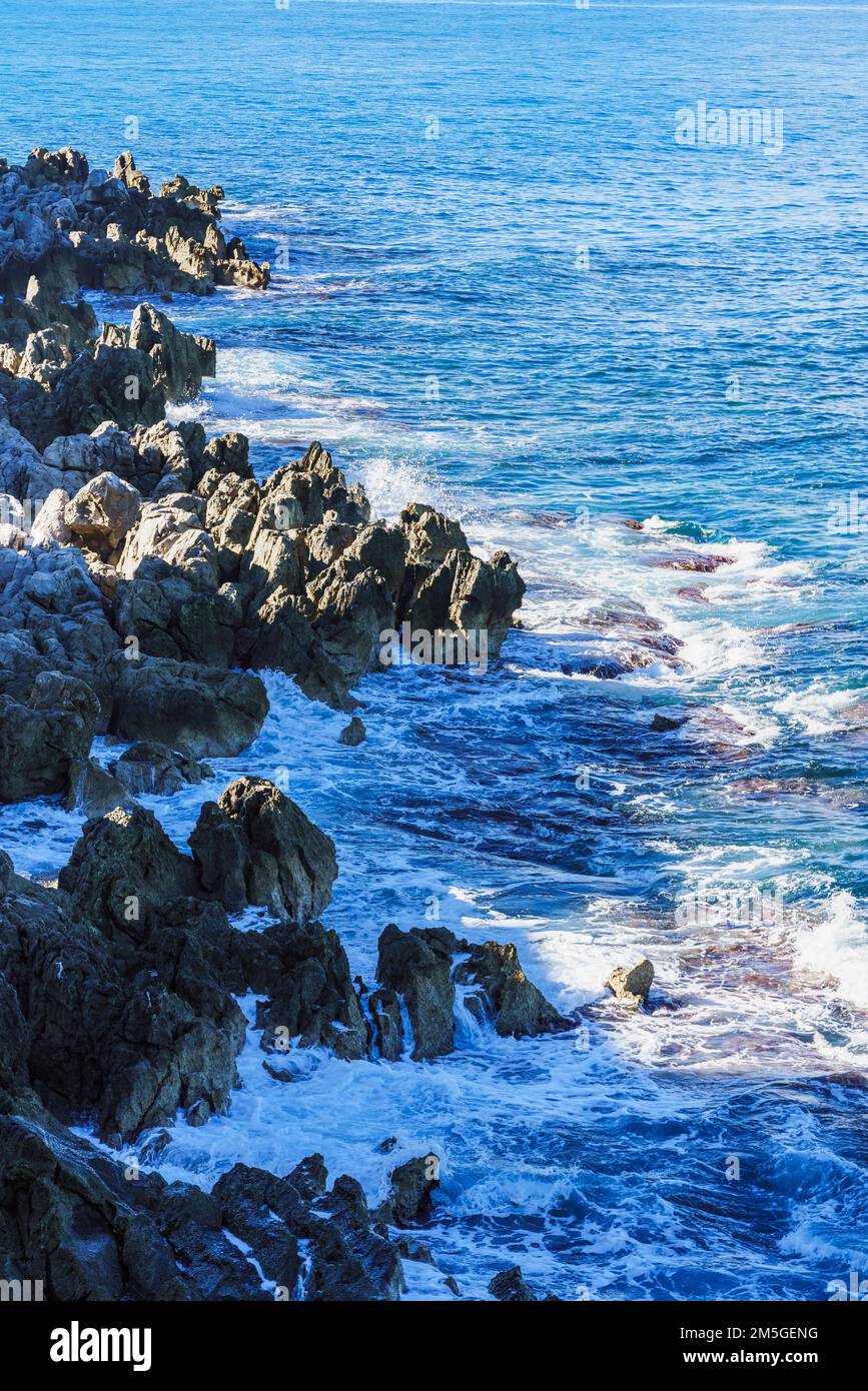 Sea waves break into the rocks Stock Photo