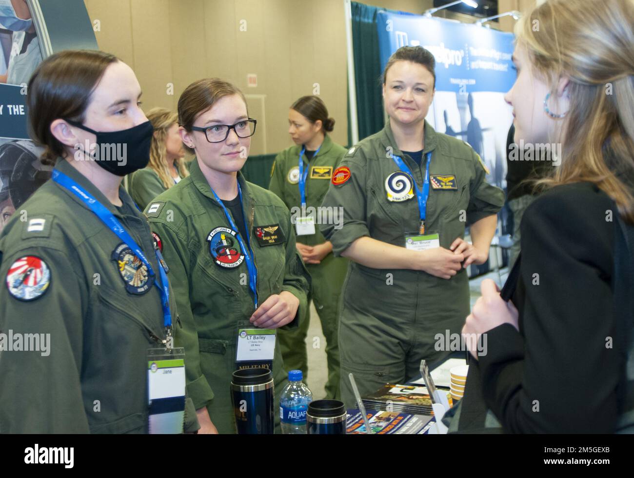 Female Naval Aviators engage with women and girls at the 33rd Annual
