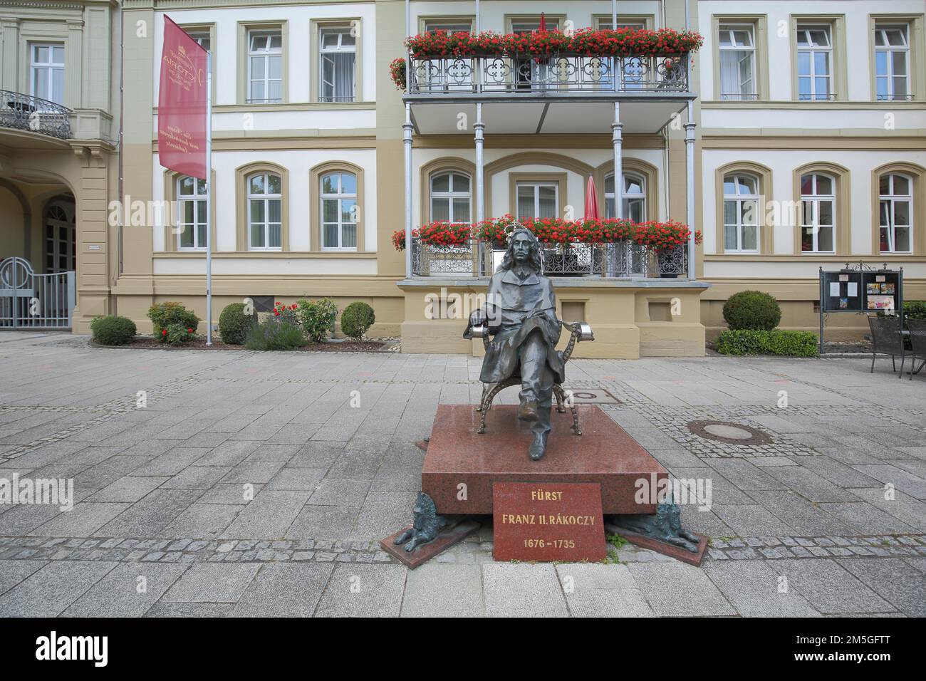 Hotel Kaiserhof Victoria with monument to Hungarian Prince Franz II Rakoczy in Bad Kissingen, Rhoen, Lower Franconia, Franconia, Bavaria, Germany Stock Photo