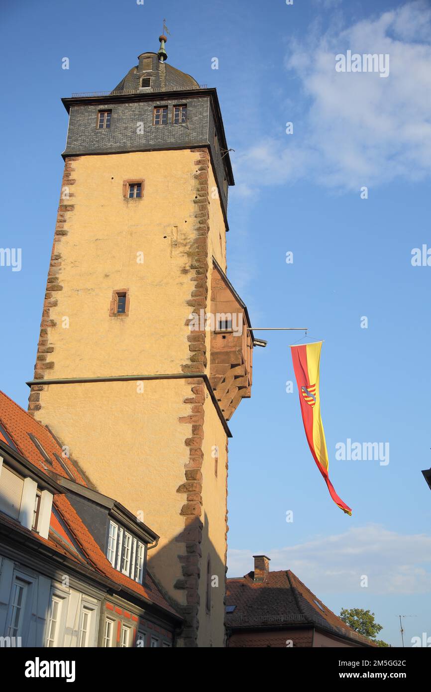 Bavarian tower built 14th century with flag and town coat of arms in Lohr am Main, Lower Franconia, Franconia, Spessart, Bavaria, Germany Stock Photo