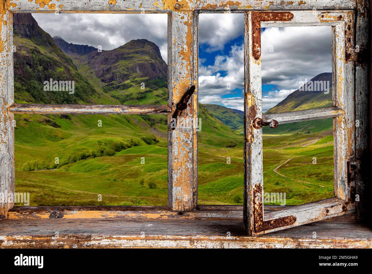 View from a wooden window to Glen Coe valley Stock Photo