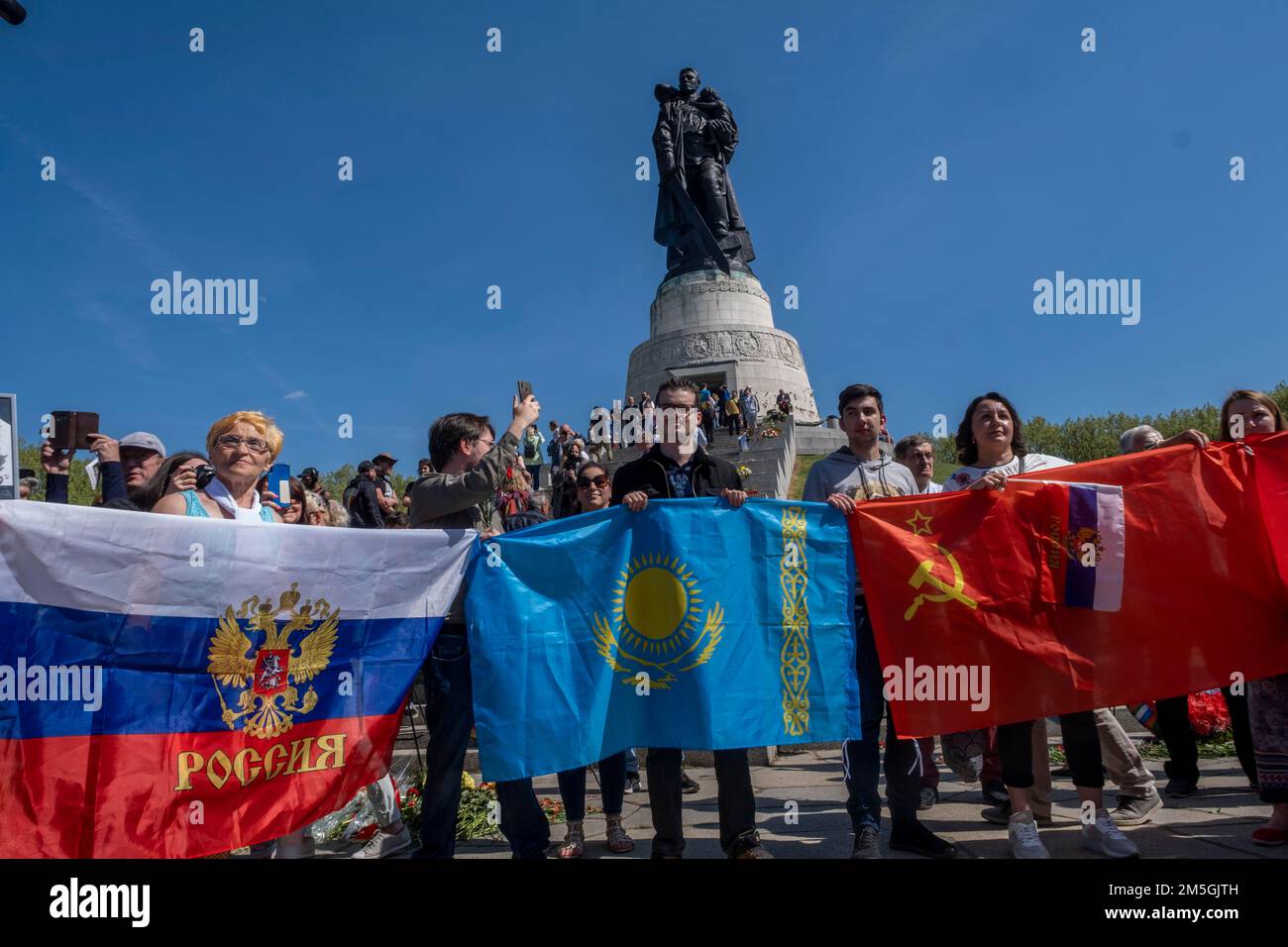 Germany, Berlin, 09. 05. 2022, Victory Day, rally at the Soviet Memorial in Treptower Park, flags Russia, Kazakhstan, Soviet Union Stock Photo