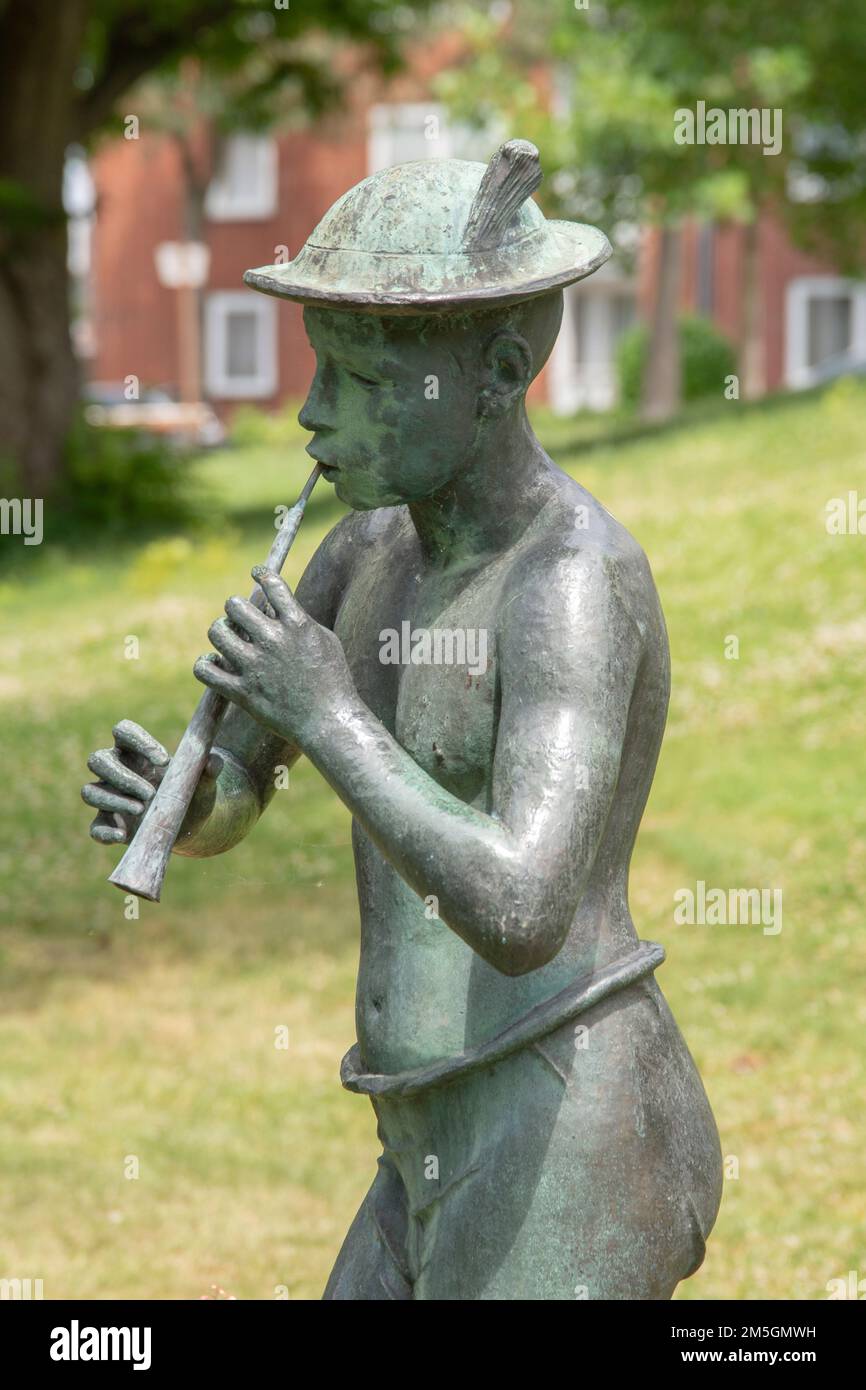 Aachen juni 2022 The flute player is a sculpture by Matthias Corr. This bronze sculpture was created in the 1920s. The flute player statue was erected Stock Photo