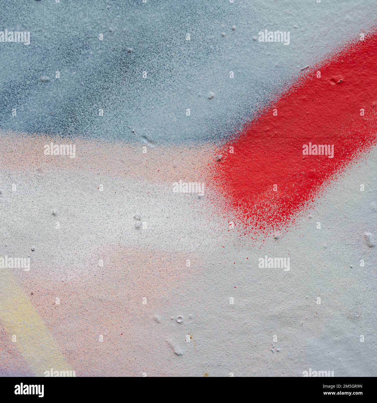 Red stripe on a blue and yellow background Stock Photo - Alamy