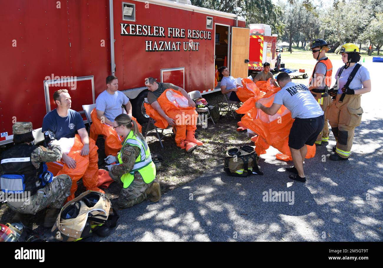 Keesler first responders prepare to retrieve simulated victims from the contaminated area during an Antiterrorism, Force Protection and Chemical, Biological, Radiological, Nuclear exercise at Keesler Air Force Base, Mississippi, March 17, 2022. The exercise tested the base's ability to respond to and recover from a mass casualty event. Stock Photo