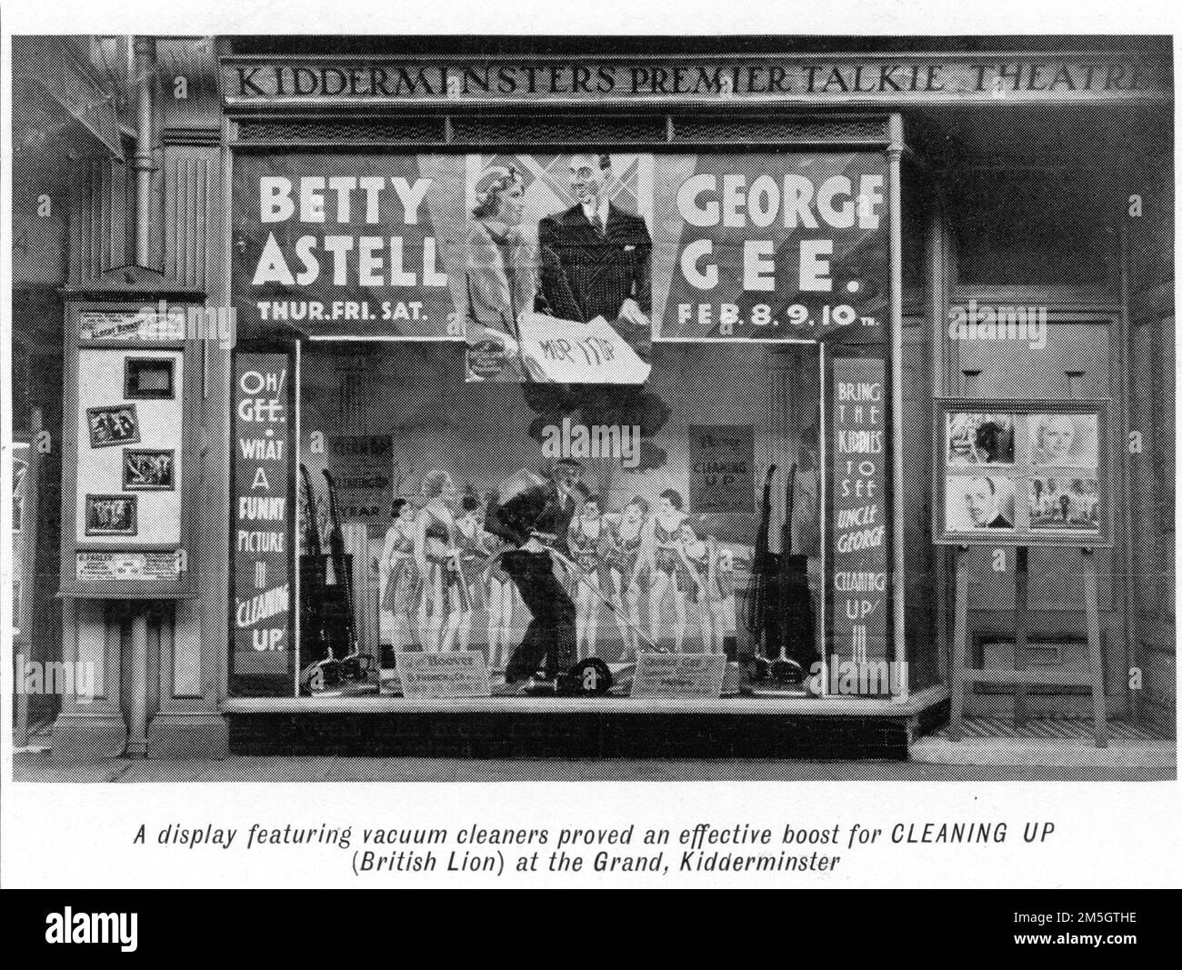 Window Display at the Grand cinema, Kidderminster, England for BETTY ASTELL and GEORGE GEE in CLEANING UP 1933 director LESLIE S. HISCOTT British Lion Film Corporation from February 22nd edition of Kinematograph Weekly Stock Photo