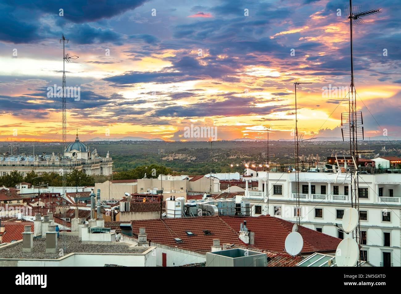 Rooftops of Madrid. Aerial View Of the Old Town Against Cloudy Sky Stock Photo