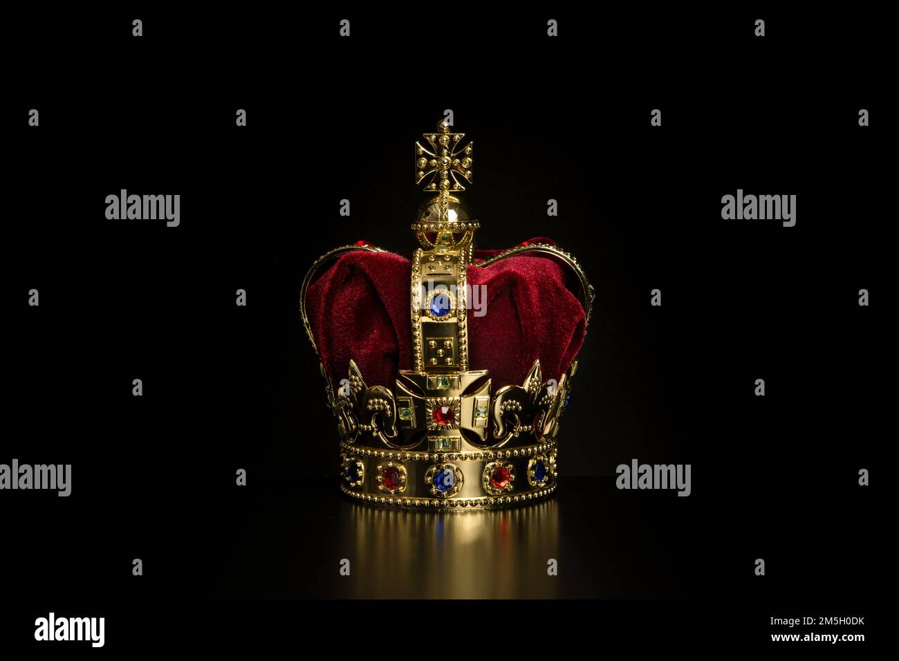 Golden crown on a black background with copy space Stock Photo - Alamy