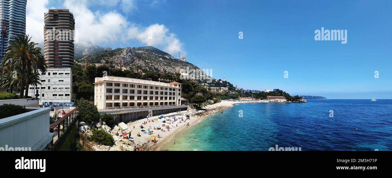 blue sea in the coast of montecarlo. monaco coastline with luxory hotel. monte carlo sea. Stock Photo