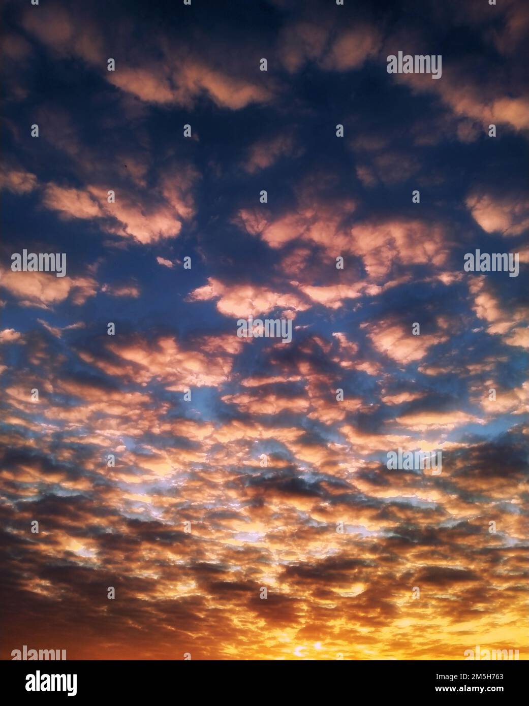sunset clouds with red and yellow tones. sky background with sunset ...