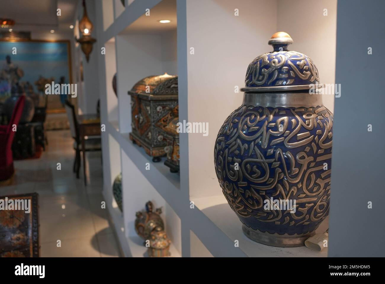 Fancy ancient looking handmade metal jar with arabic design Stock Photo