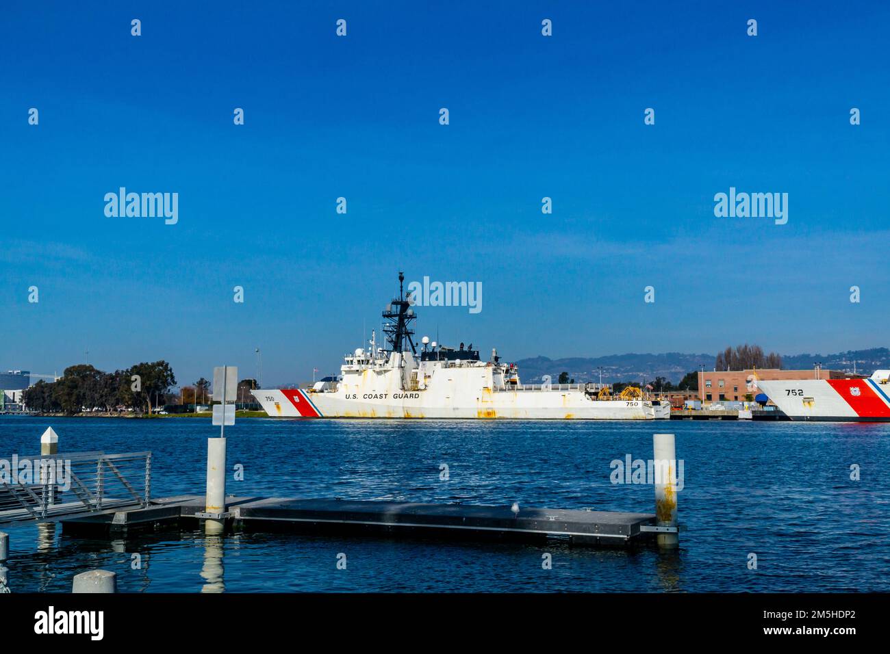 Coast Guard cutter docked at the Alameda Coast Guard Island in California USA on Christmas Eve 2022 During the King Tide event Stock Photo