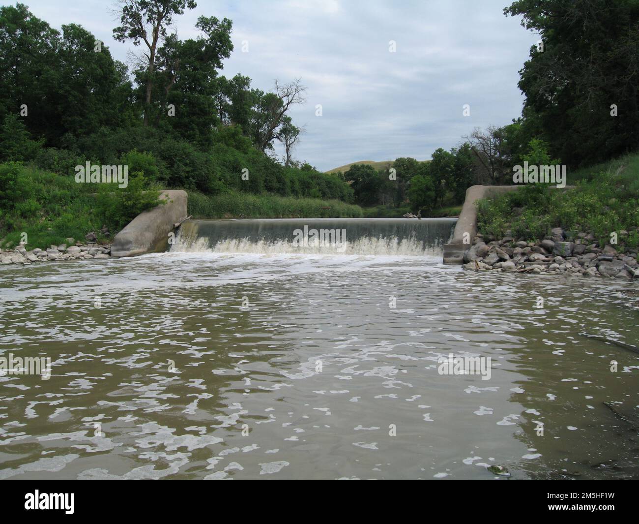 Sheyenne River Valley Scenic Byway Walker Dam. The murky brown waters of the Sheyenne River