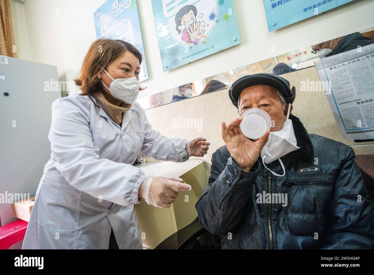 BIJIE, CHINA - DECEMBER 29, 2022 - People receive inhaled COVID-19 vaccine at the Center for Disease Control and Prevention in Bijie, Guizhou province Stock Photo