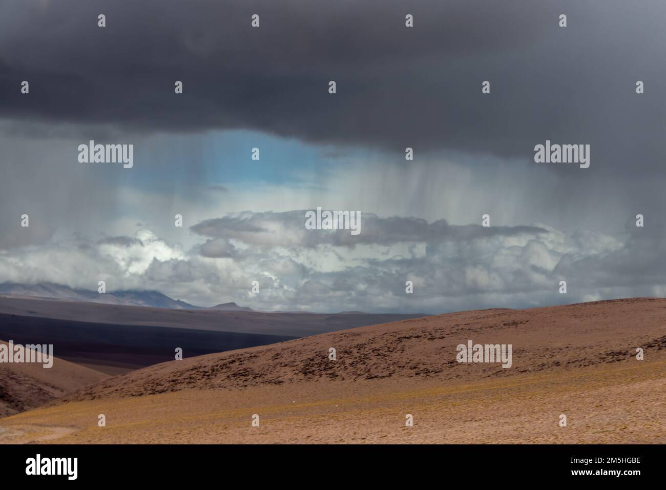 Rain falling over Atacama desert in Chile, the dryest and most extreme