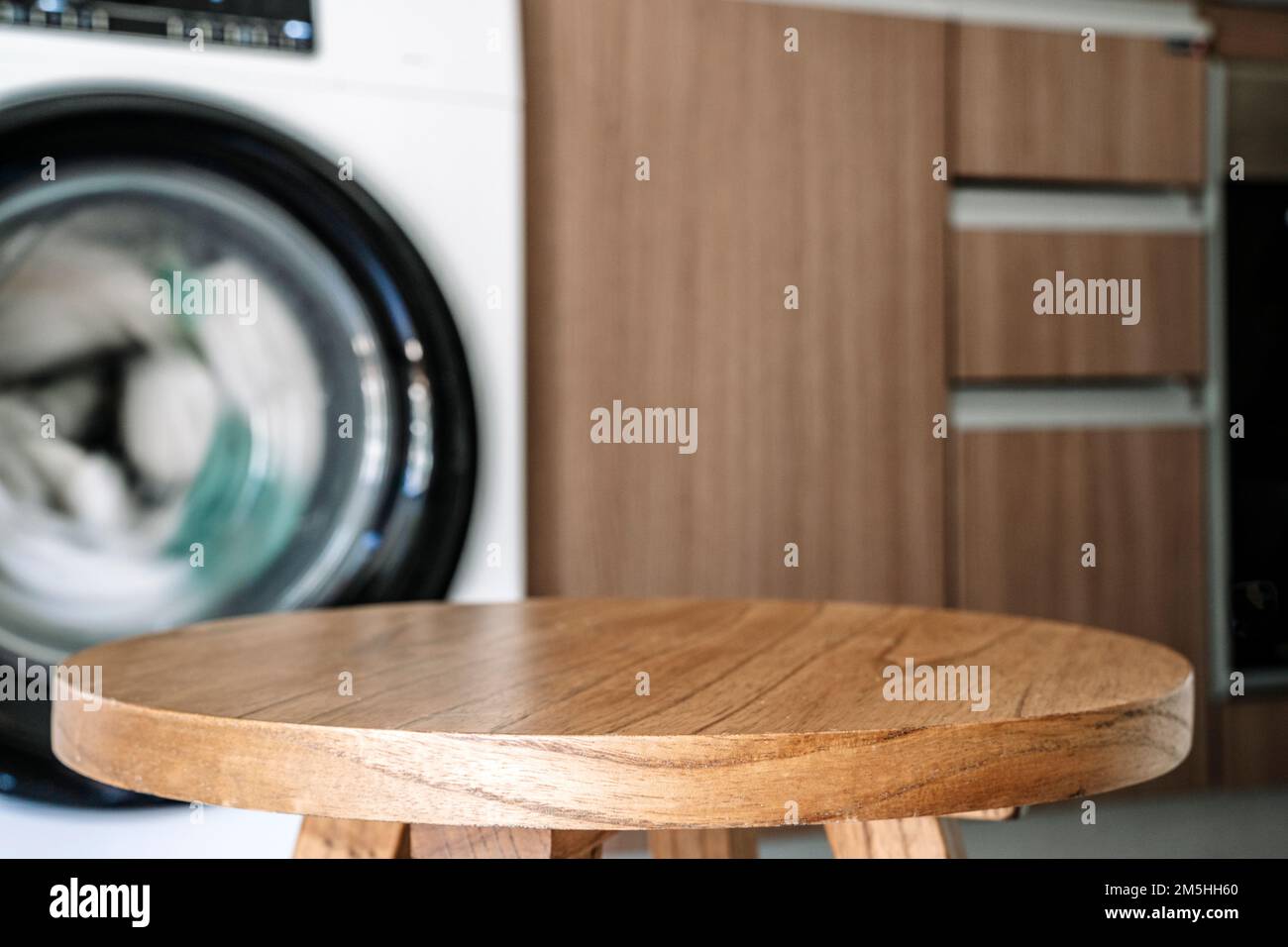 Stack of clean towels on white table in laundry room, space for text Stock  Photo - Alamy