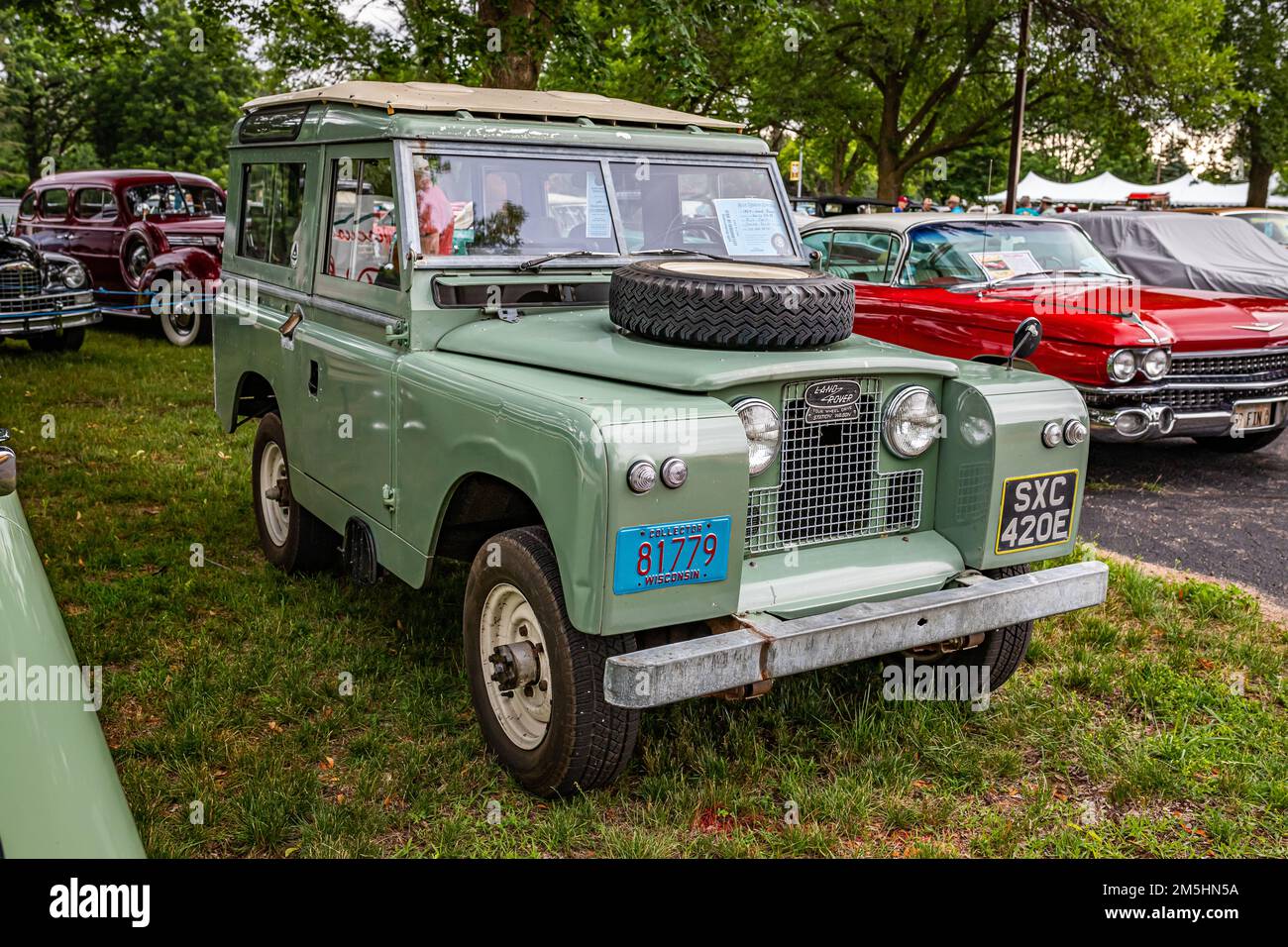 Iola, WI - July 07, 2022: High perspective front corner view of a 1967 Land Rover 88 Series IIA Station Wagon at a local car show. Stock Photo