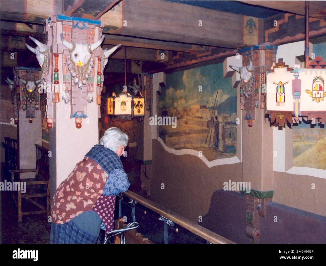 Historic Route 66 - KiMo Theater Lobby. A theater patron admires the Kimo Theater lobby from the balcony. New Mexico (35.085° N 106.651° W) Stock Photo
