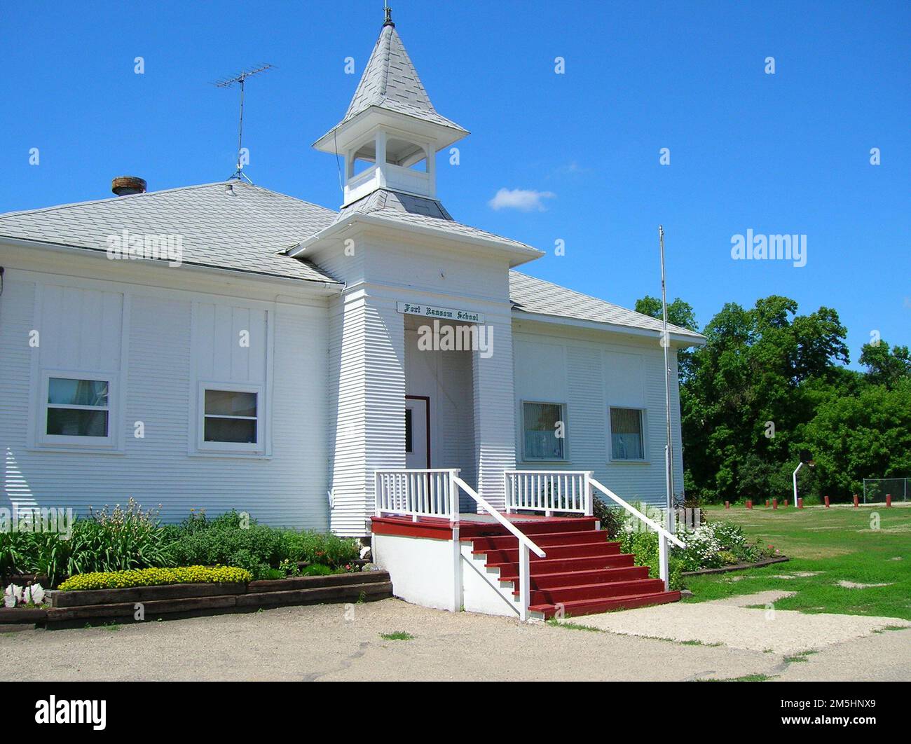 Sheyenne River Valley Scenic Byway - Schoolhouse in Fort Ransom. This historic schoolhouse in Fort Ransom (just north of the T.J. Walker Historic District) is just across the street from the Standing Rock Norwegian Evangelical Church. Location: Fort Ransom, North Dakota (46.520° N 97.927° W) Stock Photo