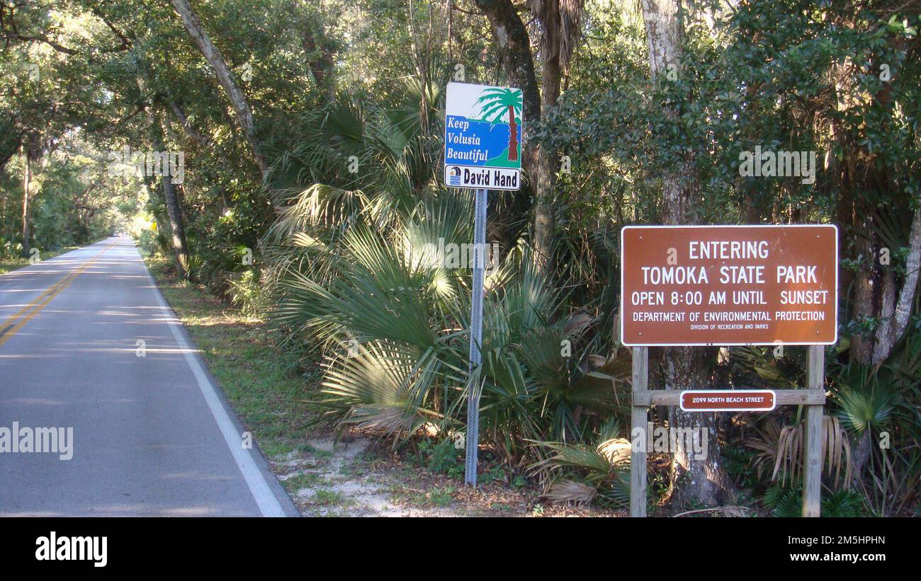 Ormond Scenic Loop & Trail Entering Tomoka State Park Sign. This brown sign indicates the