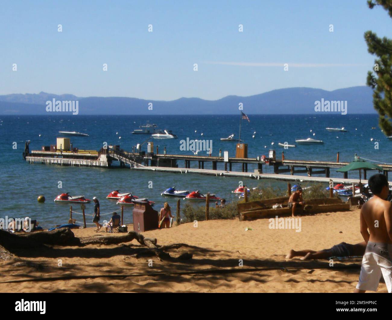 Lake Tahoe Eastshore Drive Harbor at Zephyr Cove. Umbrellas line