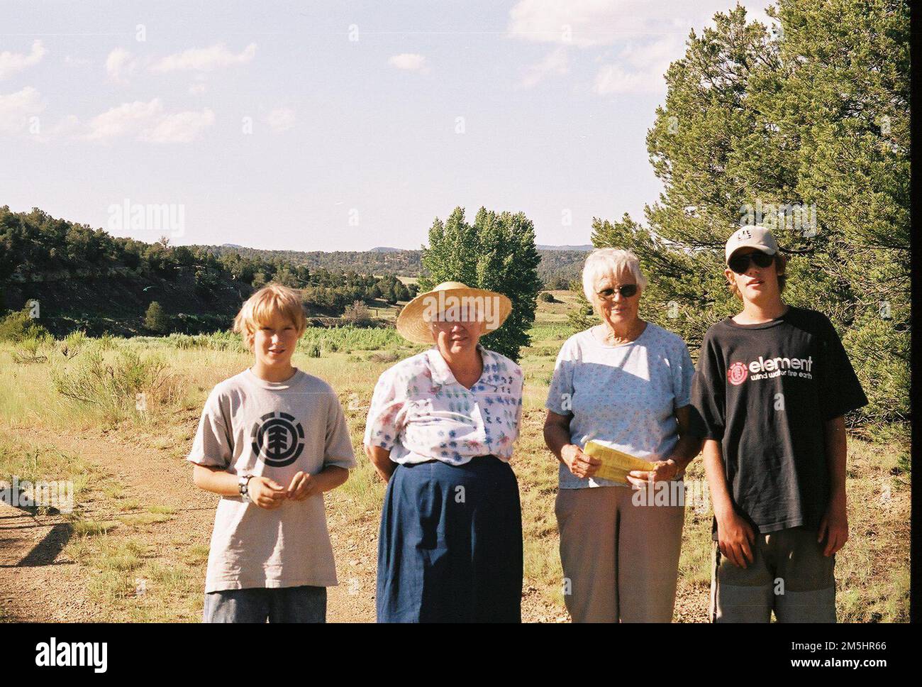 Santa Fe Trail - Hikers at Longs Canyon Trailhead. Happy hikers grace Longs Canyon Trailhead during their watchable wildlife tour of Trinidad Lake State Park. Location: Trinidad Lake State Park, Colorado (37.132° N 104.586° W) Stock Photo